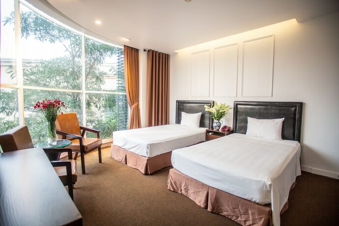 Imagen de la habitación del Hotel Dinh. Foto 16