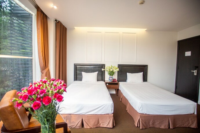 Imagen de la habitación del Hotel Dinh. Foto 21