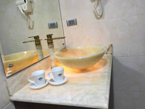 Imagen de la habitación del Hotel Dinh Gia Hotel. Foto 4