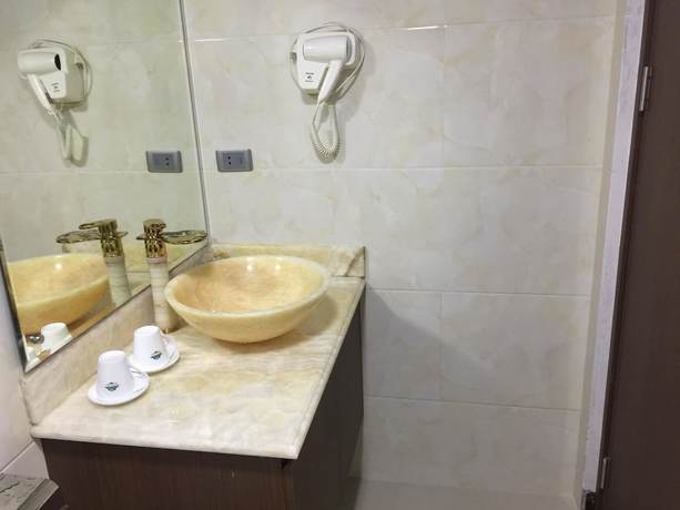 Imagen de la habitación del Hotel Dinh Gia Hotel. Foto 17