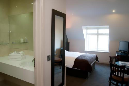 Imagen de la habitación del Hotel Dinn R&iacute;. Foto 6