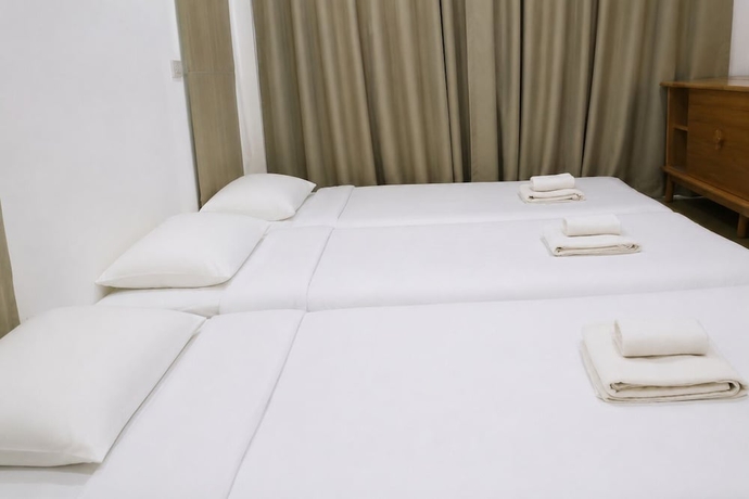 Imagen de la habitación del Hotel Dinnano. Foto 11