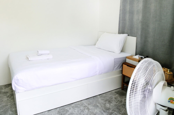 Imagen de la habitación del Hotel Dinnano. Foto 14