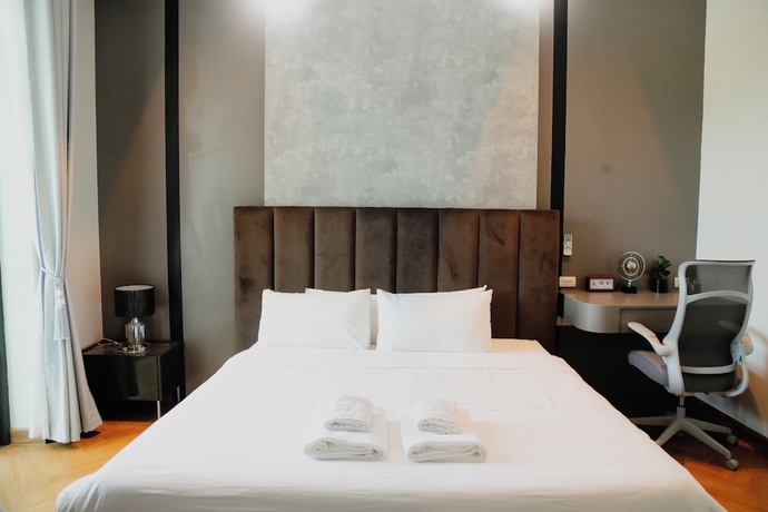 Imagen de la habitación del Hotel Dinnano. Foto 15