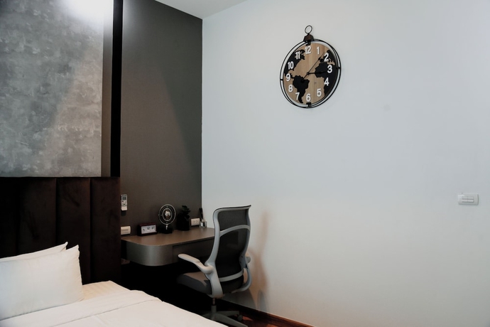 Imagen de la habitación del Hotel Dinnano. Foto 16