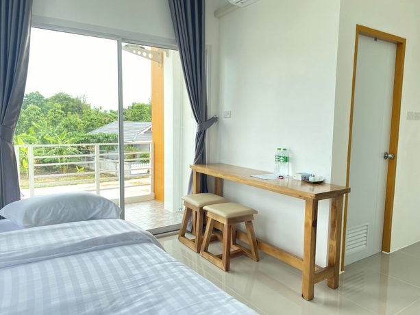 Imagen de la habitación del Hotel Dino Homestay. Foto 8