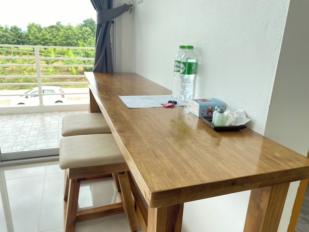 Imagen de la habitación del Hotel Dino Homestay. Foto 9