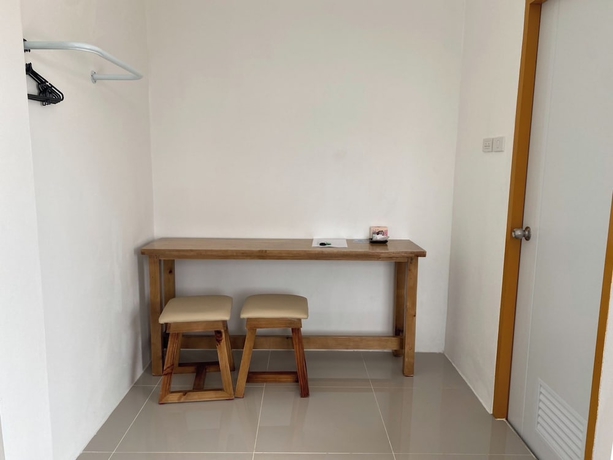 Imagen de la habitación del Hotel Dino Homestay. Foto 11