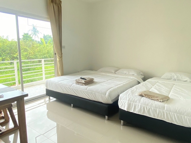 Imagen de la habitación del Hotel Dino Homestay. Foto 12