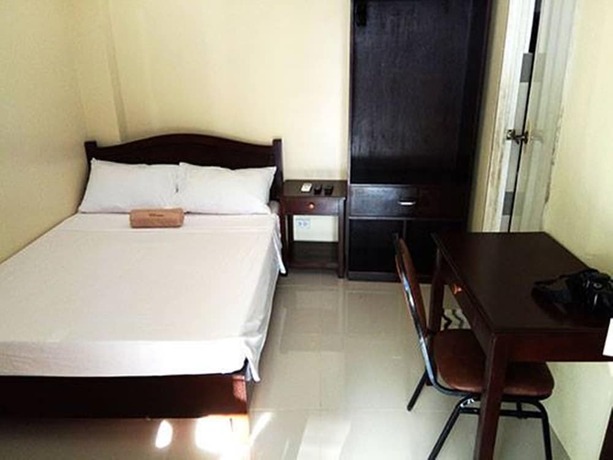 Imagen de la habitación del Hotel Dino Residences. Foto 15