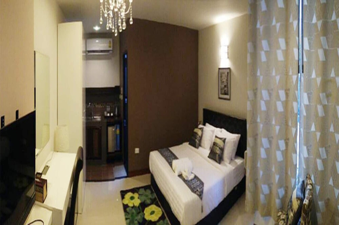 Imagen de la habitación del Hotel Dino Studio. Foto 12