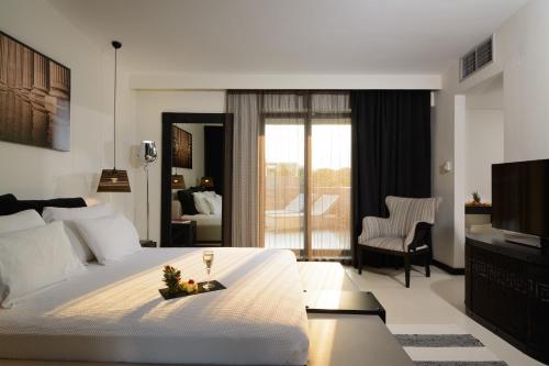 Imagen de la habitación del Hotel Dion Palace Resort and Spa. Foto 14