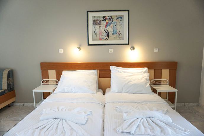 Imagen de la habitación del Hotel Dioni, Adelianos Kampos. Foto 7