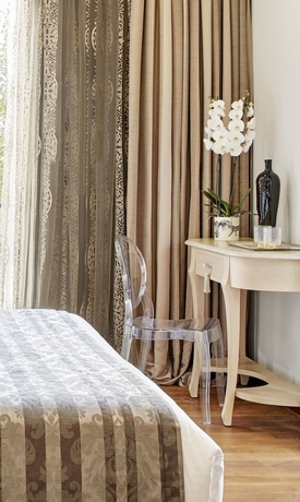 Imagen de la habitación del Hotel Dioni Boutique. Foto 16