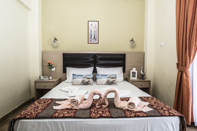 Imagen de la habitación del Hotel Dionisos Palms. Foto 19