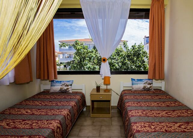 Imagen de la habitación del Hotel Dionisos Palms. Foto 20