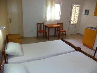 Imagen de la habitación del Hotel Dionysios Studios. Foto 8