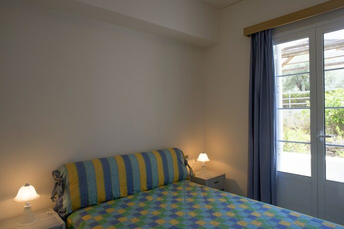 Imagen de la habitación del Hotel Dionysos Authentic Resort and Village. Foto 16