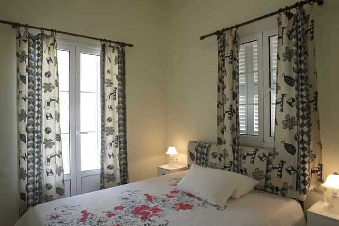 Imagen de la habitación del Hotel Dionysos Authentic Resort and Village. Foto 18
