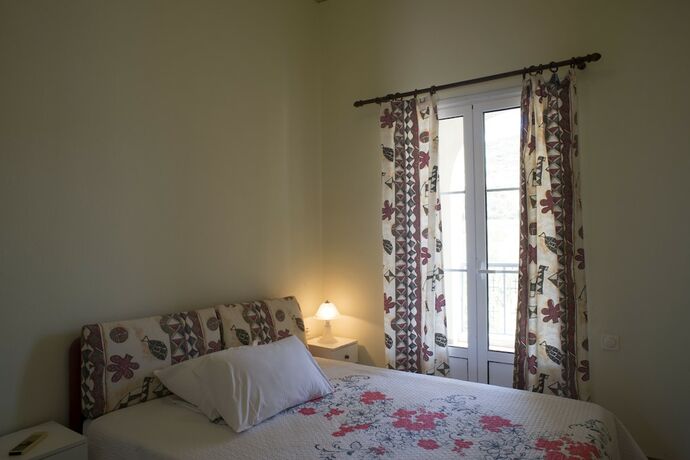 Imagen de la habitación del Hotel Dionysos Authentic Resort and Village. Foto 19