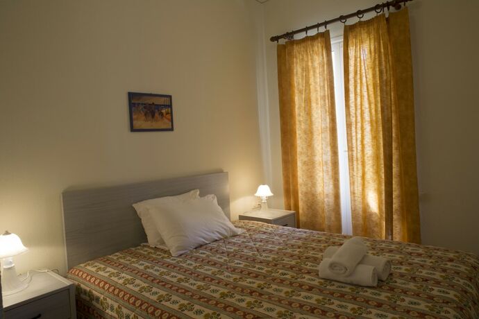 Imagen de la habitación del Hotel Dionysos Authentic Resort and Village. Foto 20