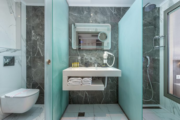 Imagen de la habitación del Hotel Dionysos Hotel and Suites. Foto 2