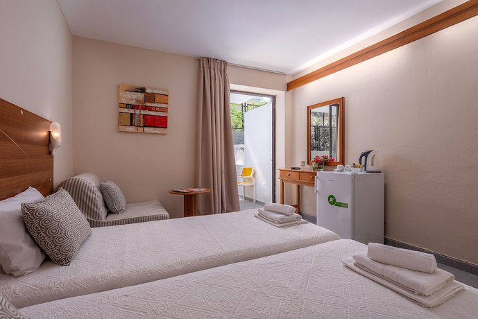 Imagen de la habitación del Hotel Dionysos Hotel and Suites. Foto 5