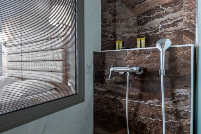 Imagen de la habitación del Hotel Dionysos Hotel and Suites. Foto 6