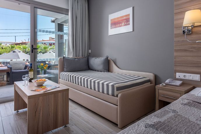 Imagen de la habitación del Hotel Dionysos Hotel and Suites. Foto 9