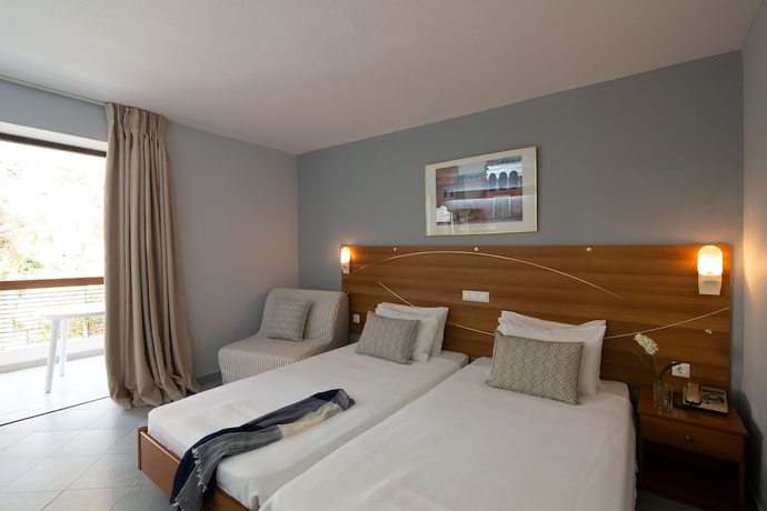 Imagen de la habitación del Hotel Dionysos Hotel and Suites. Foto 10