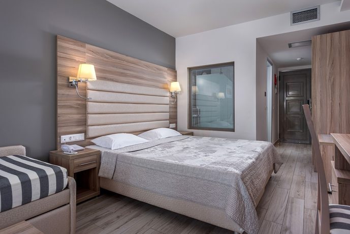 Imagen de la habitación del Hotel Dionysos Hotel and Suites. Foto 11
