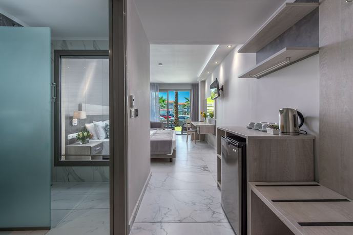 Imagen de la habitación del Hotel Dionysos Hotel and Suites. Foto 12