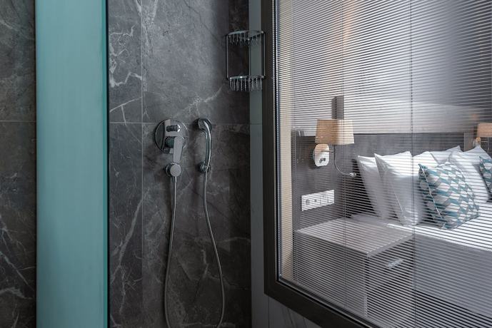 Imagen de la habitación del Hotel Dionysos Hotel and Suites. Foto 15