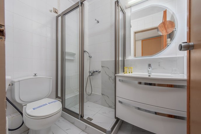 Imagen de la habitación del Hotel Dionysos Hotel and Suites. Foto 16
