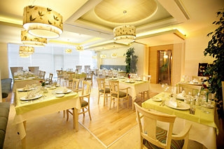 Imagen del bar/restaurante del Hotel Dionysos Hotels Sport & Spa. Foto 4