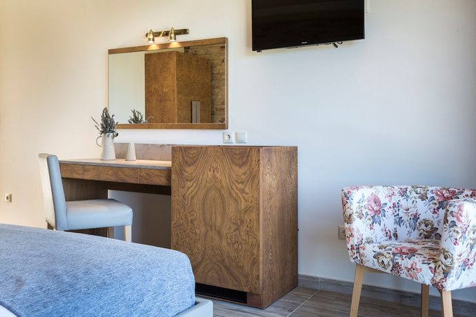 Imagen de la habitación del Hotel Dionysos Village Resort. Foto 7