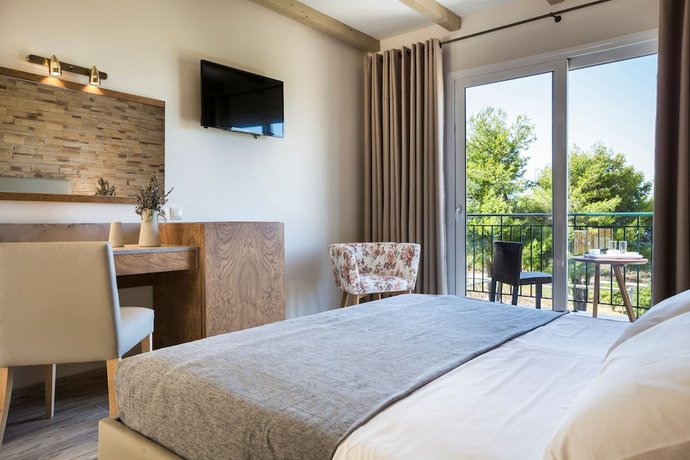 Imagen de la habitación del Hotel Dionysos Village Resort. Foto 8