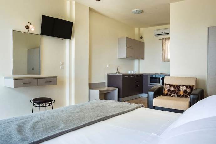 Imagen de la habitación del Hotel Dionysos Village Resort. Foto 19