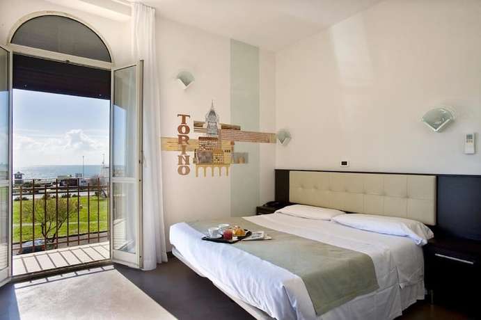 Imagen de la habitación del Hotel Dipendenza Bellavista, Lido di Ostia. Foto 2
