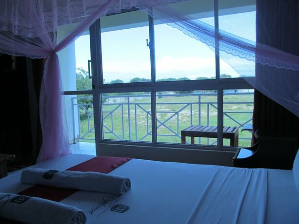 Imagen de la habitación del Hotel Diplomat Diani Beach Resort. Foto 18