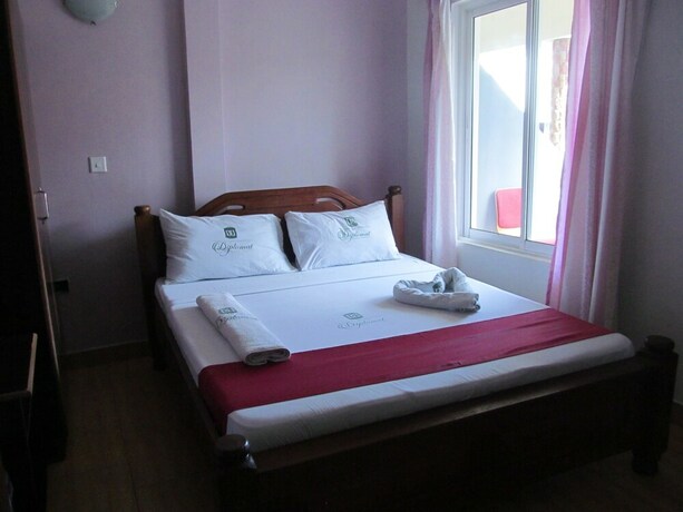 Imagen de la habitación del Hotel Diplomat Diani Beach Resort. Foto 20