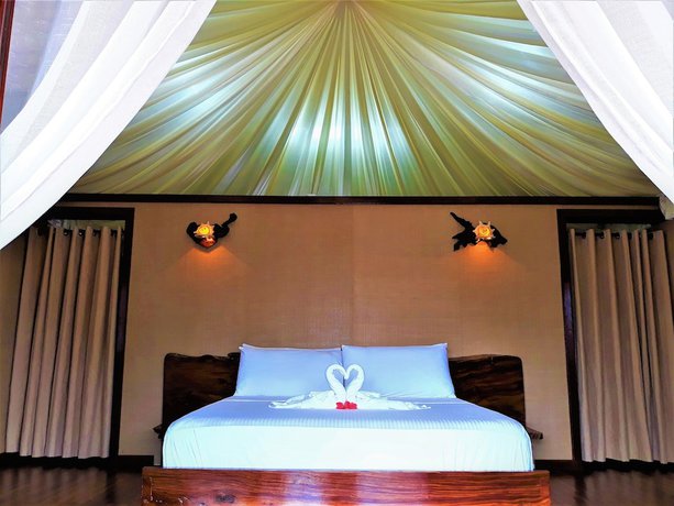 Imagen de la habitación del Hotel Dipudo Private Island Resort. Foto 4