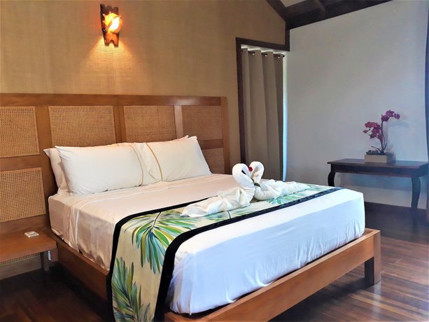 Imagen de la habitación del Hotel Dipudo Private Island Resort. Foto 6