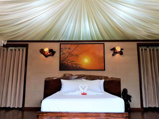 Imagen de la habitación del Hotel Dipudo Private Island Resort. Foto 10