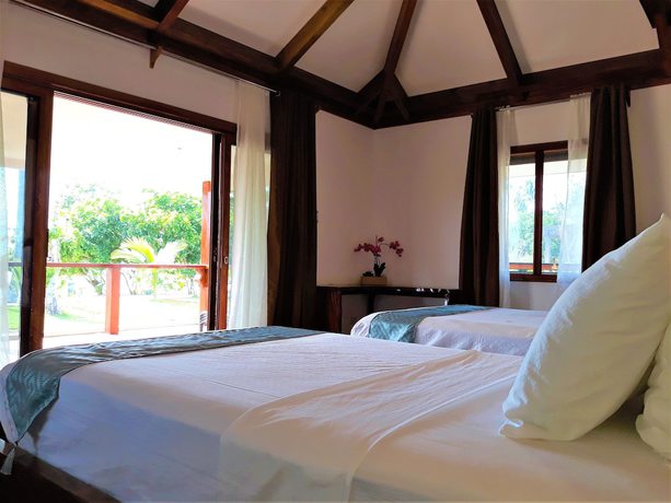 Imagen de la habitación del Hotel Dipudo Private Island Resort. Foto 11