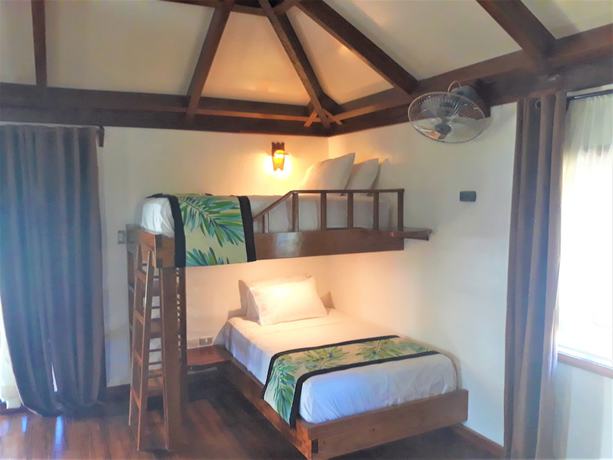 Imagen de la habitación del Hotel Dipudo Private Island Resort. Foto 15