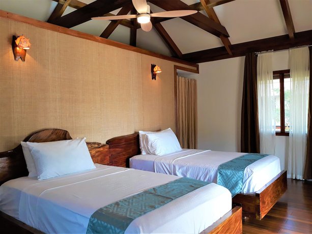 Imagen de la habitación del Hotel Dipudo Private Island Resort. Foto 17