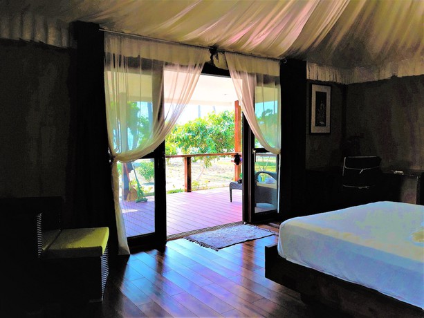 Imagen de la habitación del Hotel Dipudo Private Island Resort. Foto 18