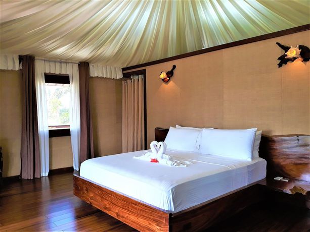Imagen de la habitación del Hotel Dipudo Private Island Resort. Foto 19