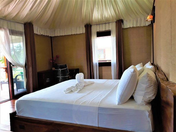 Imagen de la habitación del Hotel Dipudo Private Island Resort. Foto 20